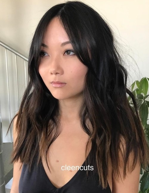 Layered Cut with Long Bangs and Choppy Ends