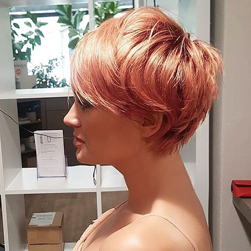 51 pixie cut with side swept bangs
