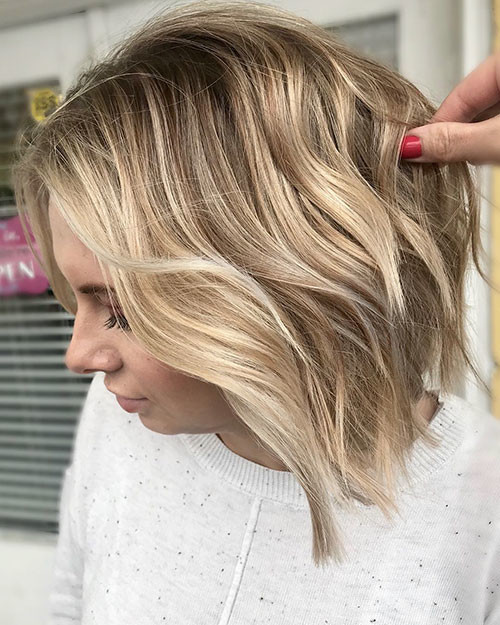 27 brown bob with blonde highlights