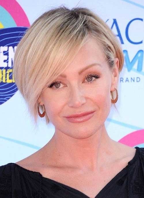 Portia de Rossi’s Short Hairstyle with Side Parted Bangs