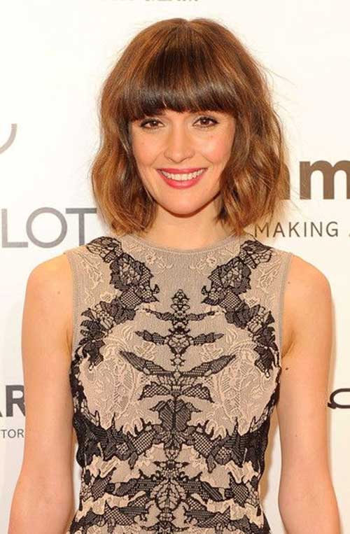 Brown Colored Wavy Hairstyle with Bangs