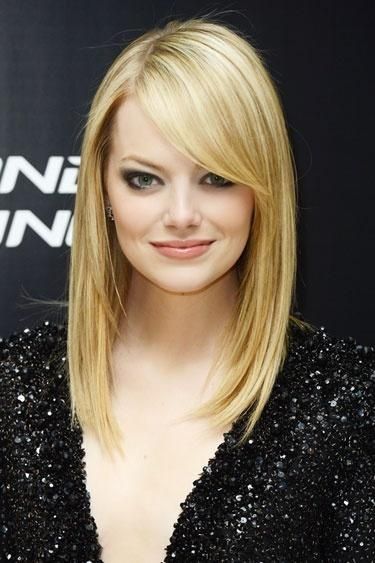 Emma Stone’s Blonde Straight Hairstyle With Bangs