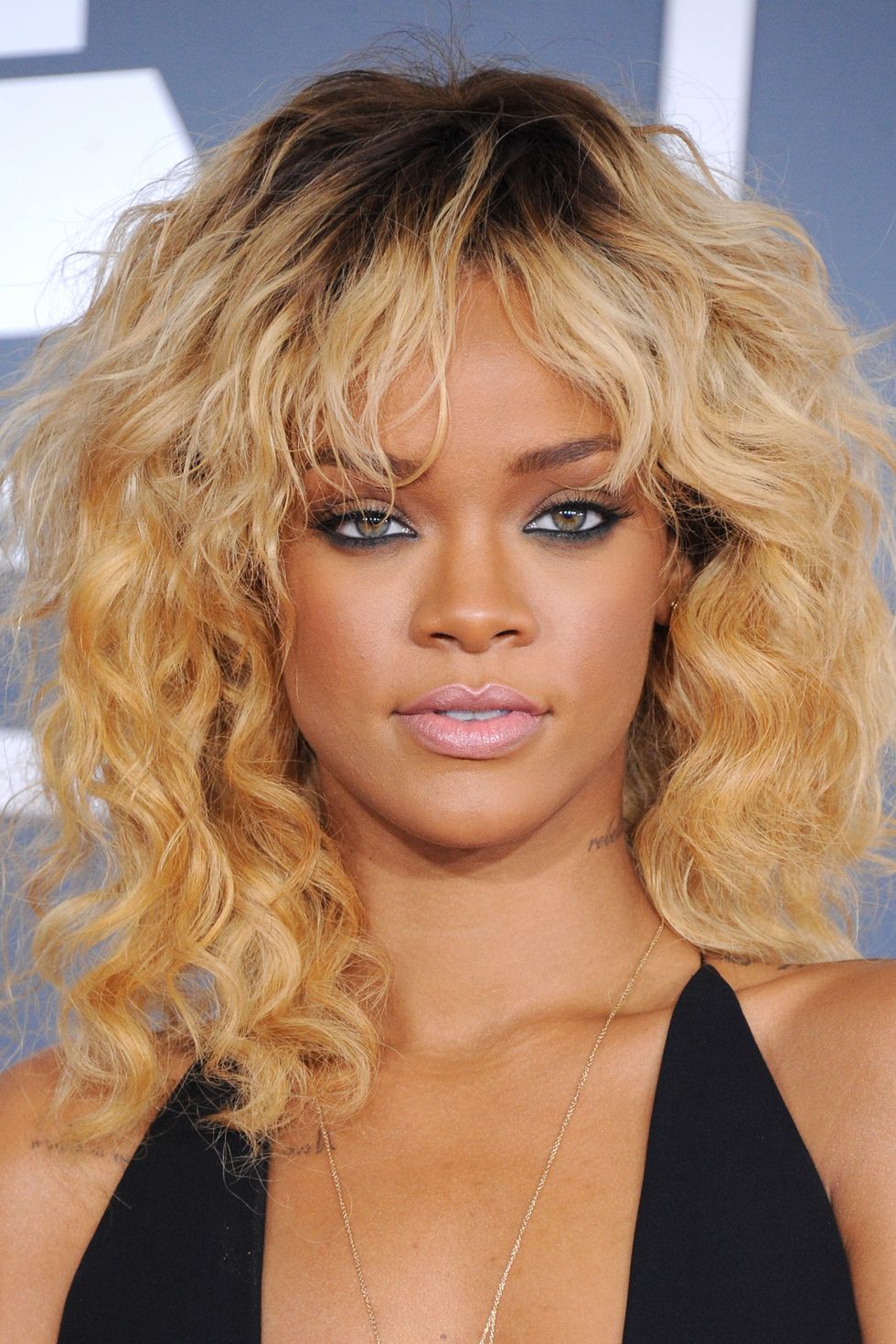 Rihannas honey blonde curly lob