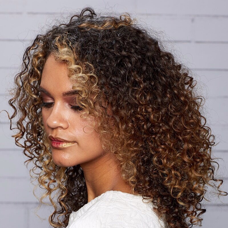 Curly Hair with Blonde and Caramel Highlights