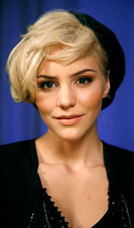 Side Swept Blonde Hairstyle with a Cap