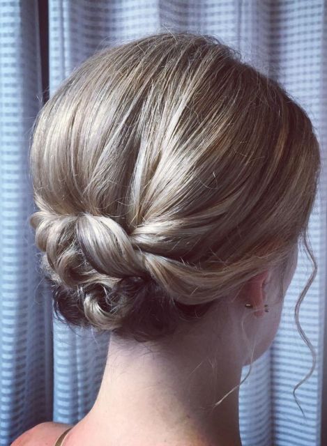 Smooth Bouffant Updo with Pinned Ends