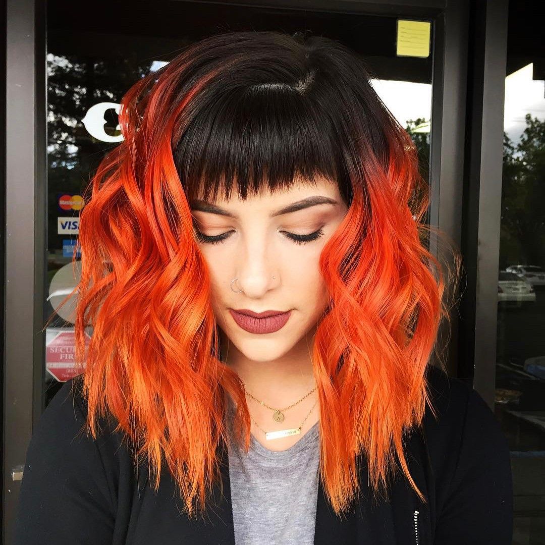 Fiery Orange Hair with Black Roots