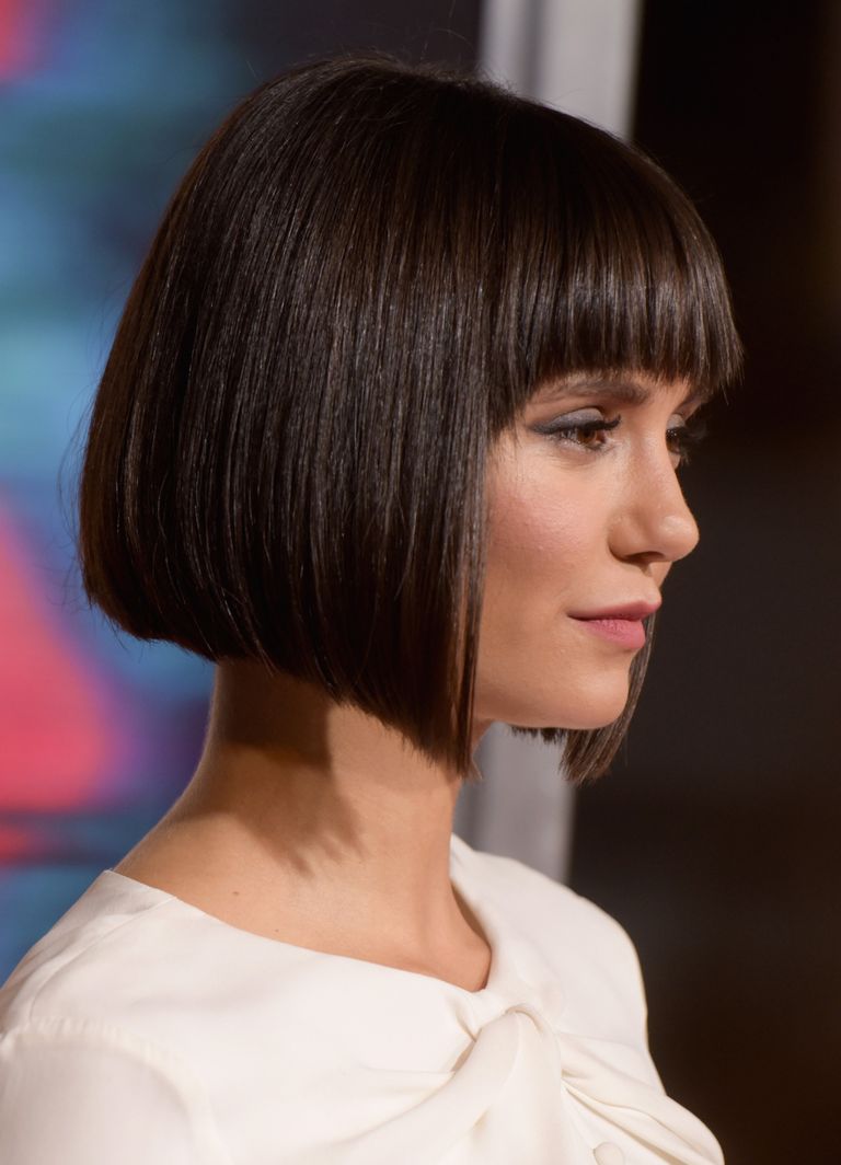 angled cut with blunt bangs and sloping layers