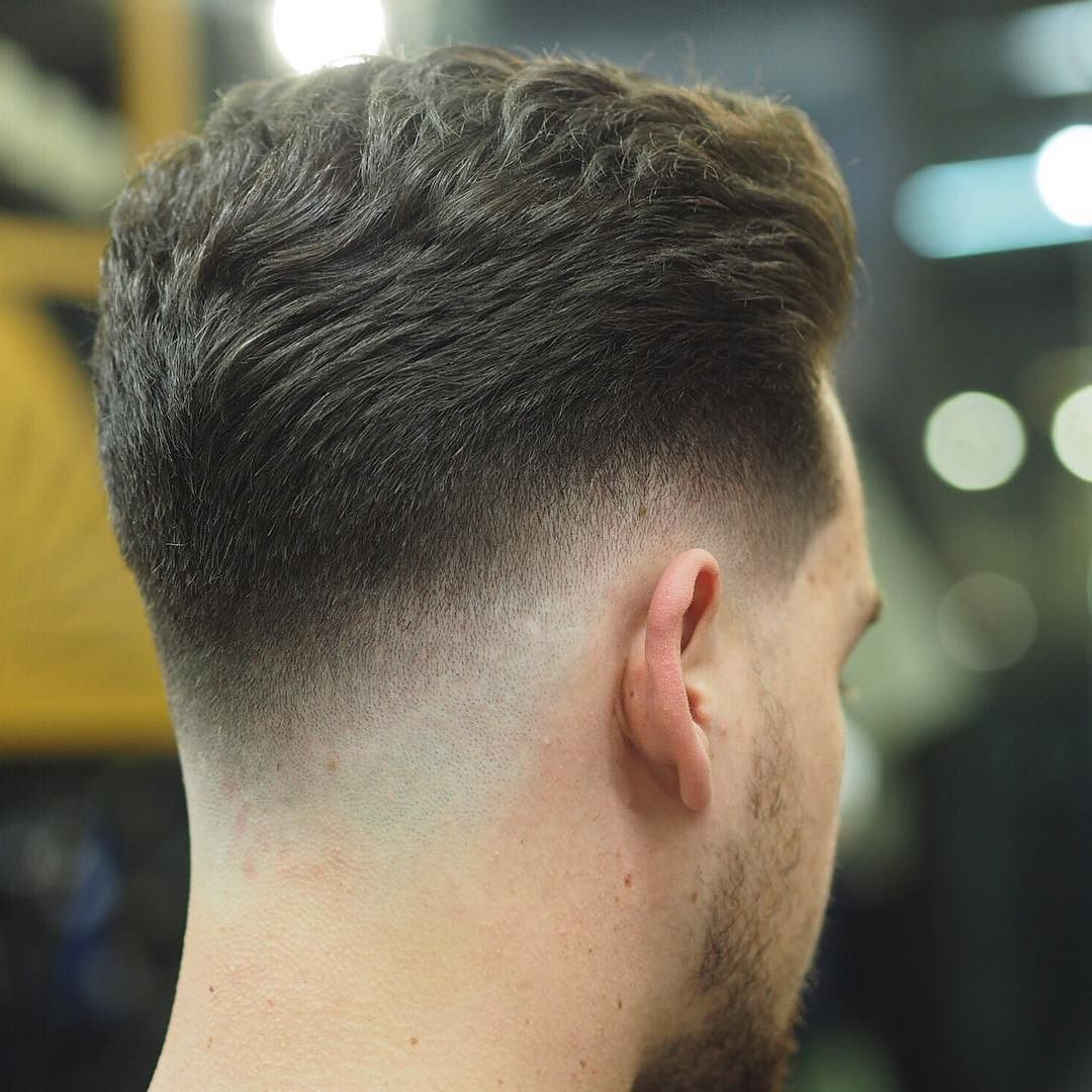 Drop Fade Haircut with V Shaped Neckline