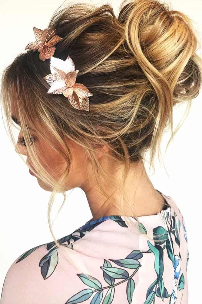 Two Toned Balayage Messy Bun with a Floral Accessory