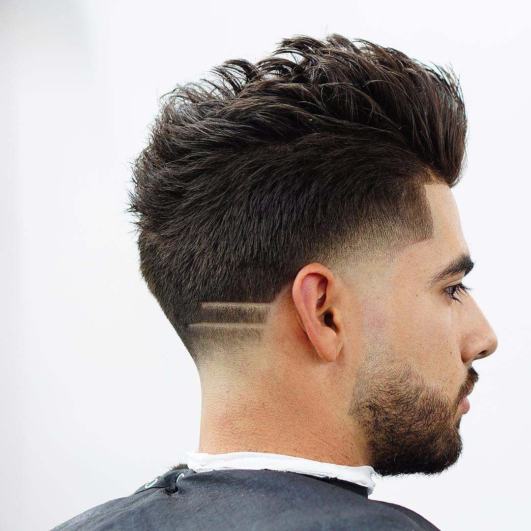 Upright Wavy Drop Fade Cut with Strikes